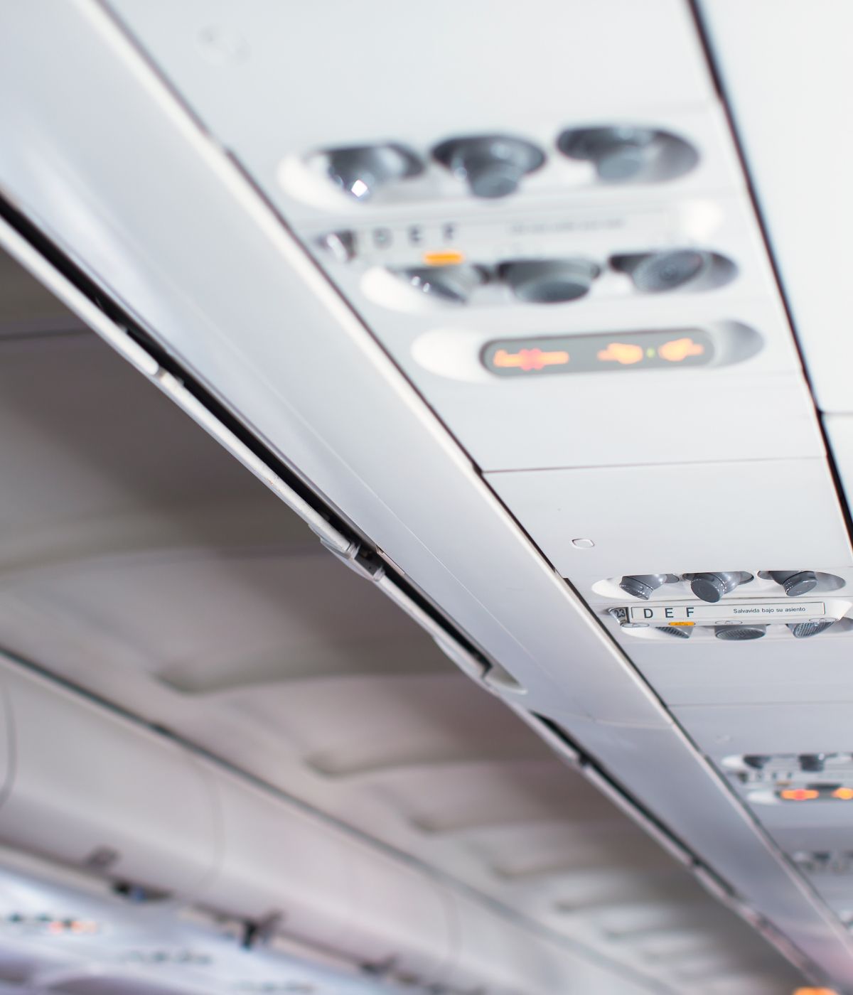 1 Broken Airplane Exit Row Light Gone Wrong 2 airplane vents and signs